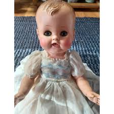 Vintage Madame Alexander drink & wet doll Dolls