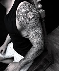 Circular mandala hand tattoo for men. Mandala Tattoo Men Chest Tattoo Designs Ideas