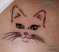 Fat cat tattoo on bicep. Cat Face Tattoo Picture