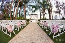 Paradise Cove Old Florida Wedding In Orlando Florida Ceremony Diy Lilac Mickey Flower Poofs Root W Paradise Cove Orlando Orlando Wedding Florida Wedding