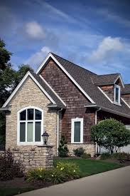 Großes, zweistöckiges, braunes rustikales haus mit steinfassade in charlotte — houzz. Pin On Design Ideas For Dream Home Residential Architecture Stone Homes