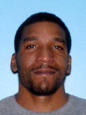 Victim's girlfriend says he got out of car and approached accused killer,  who had guns in both hands