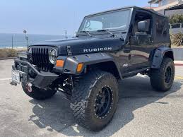 Image result for Brilliant Black 2003 Jeep