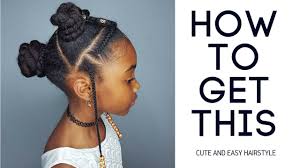A bun is a type of hairstyle in which the hair is pulled back from the face, twisted or plaited, and wrapped in a circular coil around itself, typically on top or back of the head or just above the neck. Buns Braids Beads Hairstyles For Black Girls Youtube