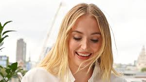 Sophie Turner oozes summer chic in a white shirt dress as she enjoys an  evening out in London after rekindling romance with Peregrine Pearson