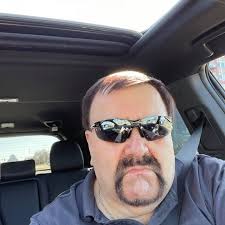 What could cause this front porch to do this? They are demanding a refund  but there's not a crack anywhere in the concrete. And yes it has plenty of  fiber in it.