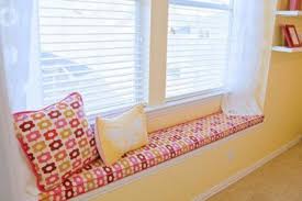 This sitting area is surrounded by greeneries that can also work as a natural privacy fence. 30 Inspirational Ideas For Cozy Window Seat