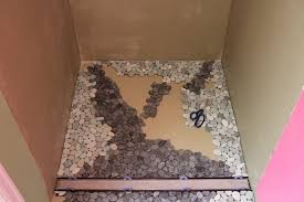 The floorelf describes using glass tile mosaics as an accent in tile installations. Glass Tile Shower With A Linear Drain In Fort Collins Tile Art Center