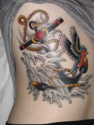 Sailors earn a new swallow tattoo for every 5,000 nautical miles traveled, which is about 5,754 regular miles, roughly the distance between new york city and tel aviv. Traditional Navy Anchor And Swallow Tattoo For Girls