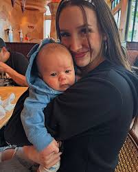 Just my baby and pretty skies 🩷🧡