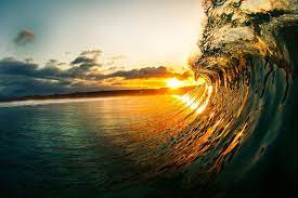 冲浪教练抢拍绝美日出日落 每次潜伏海中5小时 图 www wenxuecity com waves photography surfing photography sunset images
