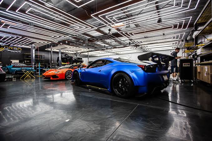 Sports car in modern workshop