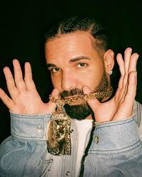 Drake flexin his Jesus piece