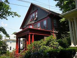 Blue is one of the popular color choices for the home in waterside settings. Grey With Red Trim More Bold Gray House Exterior House Paint Exterior House Colors