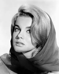 Playing around and having fun with the photographer during a photo session  for her 1st show at the Riviera Hotel in 1967.