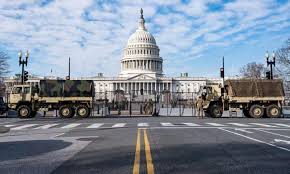 Should us capitol fence stay or go? Washington Dc Braces As Thousands Of National Guard Move In For Inauguration Day Us Capitol Breach The Guardian