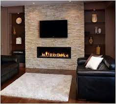 And so fireplaces have endured. Landscape Gas Fireplace With Tv Above It Basement Fireplace Fireplace Design Home