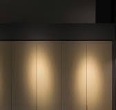 Leather-wrapped doors. Ambient lighting. Every line intentional., This  walk-in wardrobe blends elegance with quiet function — a space made to move  through, slowly., #eurocasacapetown #febalcasa ...