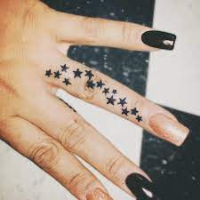 55 Unique Star Tattoo Ideas To Take Body Art To A New Level Star Tattoos Star Tattoo On Hand Star Tattoo Ideas