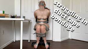 self tape bondage hot redhead upset struggle in office chair custom and tape  gag - full video available on MV! | xHamster