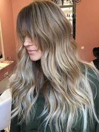 Her waves compliment her a shaped bangs that again matches her. 50 Cute And Effortless Long Layered Haircuts With Bangs Long Layered Haircuts Long Haircuts With Bangs Layered Haircuts With Bangs
