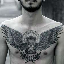 Top 39 Wing Chest Tattoo Ideas 2021 Inspiration Guide Chest Tattoo Tattoo Designs Men Chest Tattoos For Women