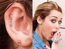 Jun 18, 2021 · miley cyrus is the face of gucci beauty's flora gorgeous parfum and wears the initial rings worn by harry styles. Tattoos Miley Cyrus Germany