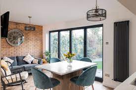 Daniela exley inspiration for a classic dining room in kent with grey walls, dark hardwood flooring and brown floors. Alternative Dining Room Chair Fabric Ideas