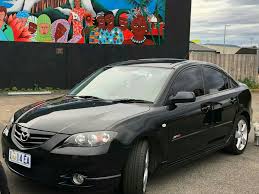 Image result for Sparkling Black 2007 Mazda3