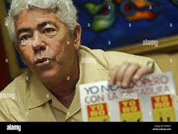 Aug 04, 2006; Miami, FL, USA; Ramon Saul Sanchez, leader of the Movimiento  Demoracia, stands aboard the boat named Human Rights, which would be used  as part of a flotilla if the