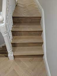 Modern Stair Cladding Without Nosing Coastal Grey Boards To Match The Coastal Grey Parquet Wood Flooring Fitted By Fin Wood Stairs Cladding Cladding Stairs