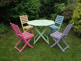Items Similar To Sold Colourful Hand Painted Hardwood Table And Chair Set On Etsy Painted Garden Furniture Upcycle Garden Wooden Garden Furniture