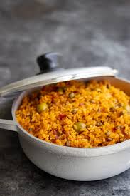 For example, nelson told me that his wife's puerto rican aunt uses chicken thighs in place of the usual pork that traditional recipes call for; Arroz Con Gandules Puerto Rican Rice With Pigeon Peas Recipe Kitchen De Lujo