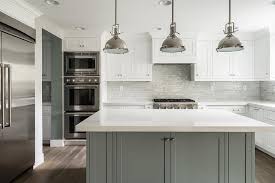 white kitchen with grey island