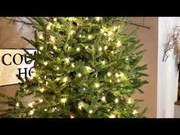 Shortening christmas lights wired in parallel. How To Put Lights On A Christmas Tree Video Christmas Tree Decorating Tips Youtube