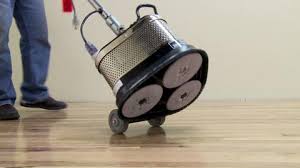 Hardwood floor refinishing involves sanding of the wooden panels and adding a fresh protective layer. Clarke American Sanders Random Orbit Floor Sander Rental 07163a The Home Depot