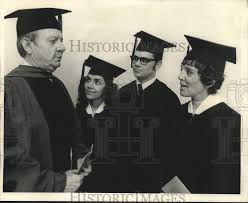 1972 Press Photo LSU Chancellor Homer L. Hitt congratulates honor graduates