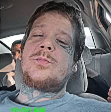 A 22-year-old woman has been arrested after police say she intentionally  set fire to her sister's mattress in an attempt to kill her.