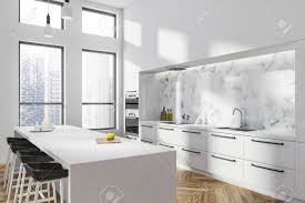 A white kitchen with a white marble backsplash and metal details for a cool look. Corner Of Modern Kitchen With White And White Marble Walls Wooden Stock Photo Picture And Royalty Free Image Image 113596327
