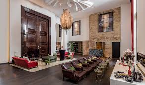 Hotel Zoo Berlin At The Heart Of The Hotel The Welcoming Living Room Entices Guests To Linger And A Double Sided Hotel Interior Design Design Hotel Interior