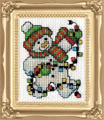 This cute snowman is part of my holiday cross stitch pdf pattern line. 517 Snowman Lights 021465005171