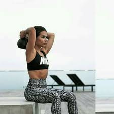 This is not the most natural or convenient way to work the triceps but overhead extensions became popular in the belief that extending your arm overhead would allow you to focus on the long head of the tricep. Triceps Extension With Kettlebell Exercise How To Workout Trainer By Skimble