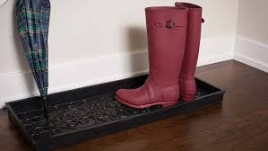 It also comes with a removable plastic tray at the bottom that is perfect for removing and disposing of the occasional bit of pet exhaust. 16 Boot Trays To Keep Your Shoes From Making A Mess
