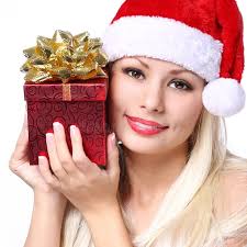 Donna Di Natale in Santa Hat Che Fa Un Segno Di Silenzio Immagine Stock