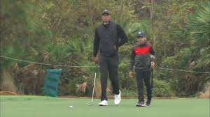 Tiger woods' son charlie steals show, pumps fist at pnc championship. Tiger Woods Practices With His Son Charlie Ahead Of Pnc Championship Youtube
