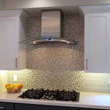 Glass Tile Backsplash In A Modern Kitchen Featuring Tones Of Browns And Grays Kitchen Tiles Backsplash Modern Kitchen Tile Backsplash