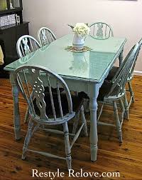The rectangular glass encased chandelier is also a good choice to provide light over the rectangular table. Farmhouse Style Vintage Green Dining Table Chairs