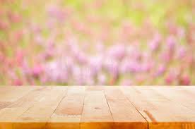 Wood Table Top On Blur Flower Garden Background Can Montage Or Display Your Pro Aff Blur Flower Top W Wood Table Top Wood Table Brick Wall Backdrop