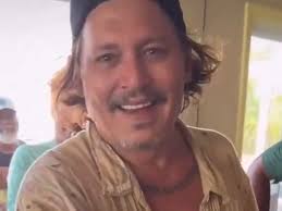Johnny Depp shows off major dental transformation after shocking fans with  'rotting' teeth