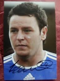 LEE TOMLIN
